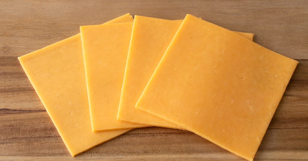 Extra cheddar cheese for topping